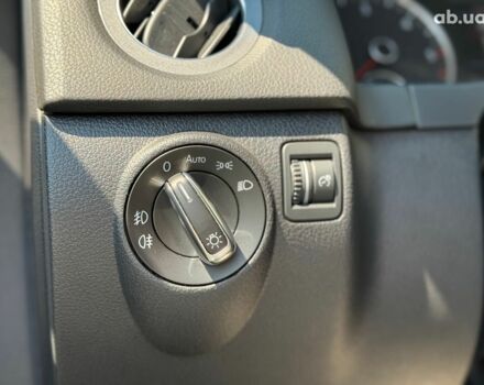 Білий Фольксваген Тігуан, об'ємом двигуна 2 л та пробігом 250 тис. км за 16490 $, фото 24 на Automoto.ua