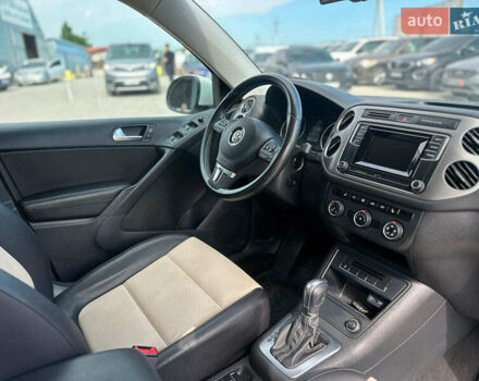 Білий Фольксваген Тігуан, об'ємом двигуна 2 л та пробігом 152 тис. км за 12300 $, фото 28 на Automoto.ua