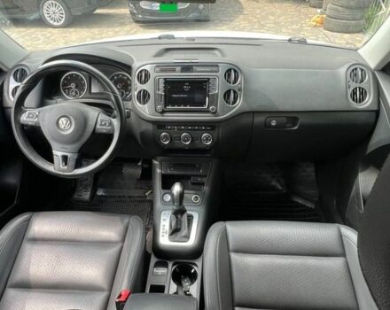 Белый Фольксваген Тигуан, объемом двигателя 2 л и пробегом 200 тыс. км за 14000 $, фото 1 на Automoto.ua