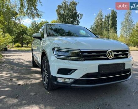 Білий Фольксваген Тігуан, об'ємом двигуна 2 л та пробігом 270 тис. км за 23000 $, фото 1 на Automoto.ua
