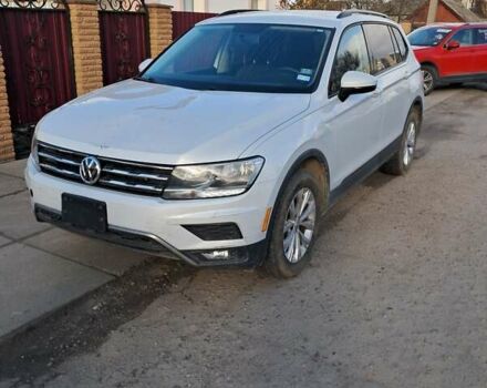 Белый Фольксваген Тигуан, объемом двигателя 2 л и пробегом 243 тыс. км за 13700 $, фото 1 на Automoto.ua