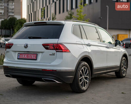 Білий Фольксваген Тігуан, об'ємом двигуна 2 л та пробігом 169 тис. км за 20900 $, фото 1 на Automoto.ua