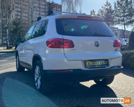 Білий Фольксваген Тігуан, об'ємом двигуна 2 л та пробігом 150 тис. км за 15999 $, фото 4 на Automoto.ua
