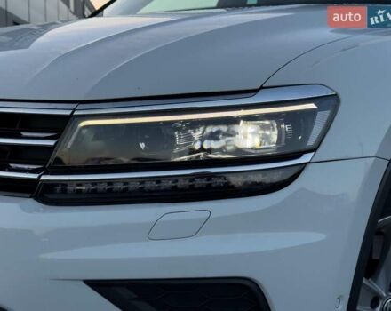 Білий Фольксваген Тігуан, об'ємом двигуна 2 л та пробігом 161 тис. км за 24880 $, фото 1 на Automoto.ua