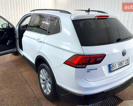 Білий Фольксваген Тігуан, об'ємом двигуна 2 л та пробігом 145 тис. км за 23600 $, фото 64 на Automoto.ua