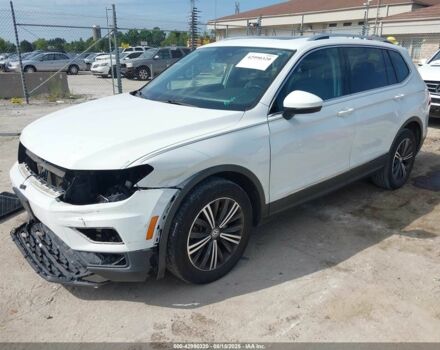 Белый Фольксваген Тигуан, объемом двигателя 2 л и пробегом 193 тыс. км за 13200 $, фото 1 на Automoto.ua