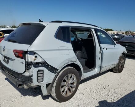 Білий Фольксваген Тігуан, об'ємом двигуна 2 л та пробігом 160 тис. км за 12999 $, фото 5 на Automoto.ua