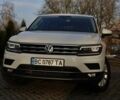 Белый Фольксваген Тигуан, объемом двигателя 2 л и пробегом 243 тыс. км за 24000 $, фото 1 на Automoto.ua