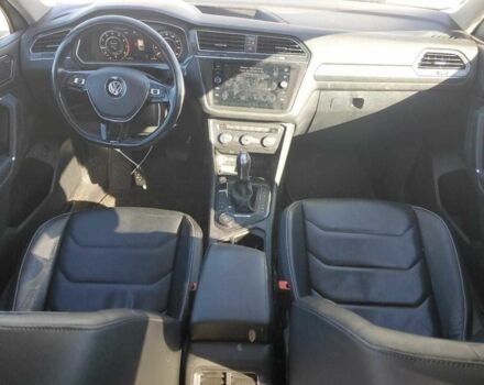 Білий Фольксваген Тігуан, об'ємом двигуна 2 л та пробігом 74 тис. км за 11000 $, фото 7 на Automoto.ua