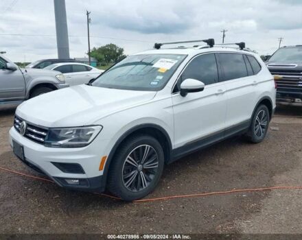 Белый Фольксваген Тигуан, объемом двигателя 2 л и пробегом 72 тыс. км за 4800 $, фото 1 на Automoto.ua