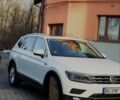 Белый Фольксваген Тигуан, объемом двигателя 2 л и пробегом 243 тыс. км за 24000 $, фото 1 на Automoto.ua