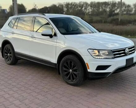 Білий Фольксваген Тігуан, об'ємом двигуна 2 л та пробігом 70 тис. км за 14000 $, фото 2 на Automoto.ua