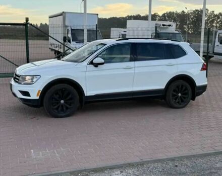 Білий Фольксваген Тігуан, об'ємом двигуна 2 л та пробігом 70 тис. км за 14000 $, фото 4 на Automoto.ua