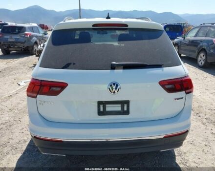 Білий Фольксваген Тігуан, об'ємом двигуна 2 л та пробігом 98 тис. км за 13200 $, фото 2 на Automoto.ua