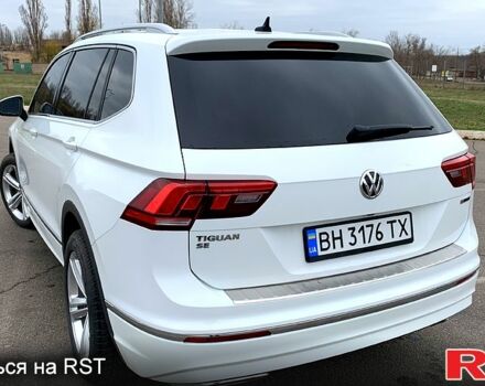 Білий Фольксваген Тігуан, об'ємом двигуна 2 л та пробігом 132 тис. км за 20000 $, фото 2 на Automoto.ua