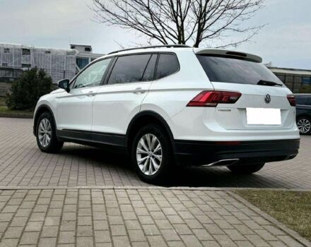 Білий Фольксваген Тігуан, об'ємом двигуна 2 л та пробігом 54 тис. км за 11700 $, фото 4 на Automoto.ua