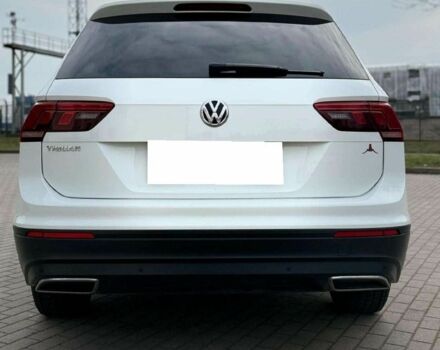 Білий Фольксваген Тігуан, об'ємом двигуна 2 л та пробігом 54 тис. км за 11700 $, фото 1 на Automoto.ua