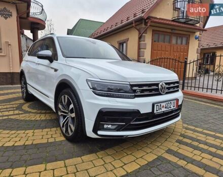 Білий Фольксваген Тігуан, об'ємом двигуна 2 л та пробігом 245 тис. км за 28900 $, фото 1 на Automoto.ua