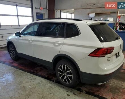 Белый Фольксваген Тигуан, объемом двигателя 2 л и пробегом 150 тыс. км за 4100 $, фото 1 на Automoto.ua