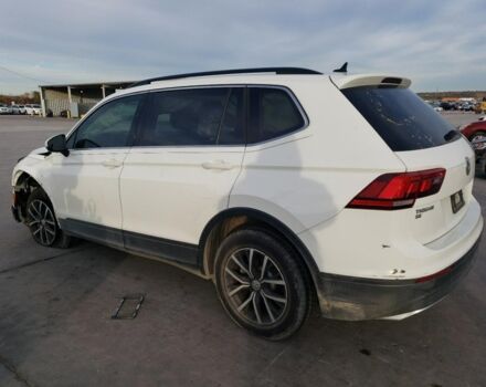 Білий Фольксваген Тігуан, об'ємом двигуна 2 л та пробігом 132 тис. км за 10950 $, фото 2 на Automoto.ua