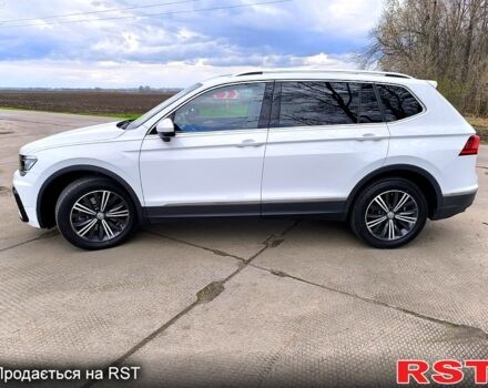 Білий Фольксваген Тігуан, об'ємом двигуна 2 л та пробігом 116 тис. км за 23000 $, фото 2 на Automoto.ua