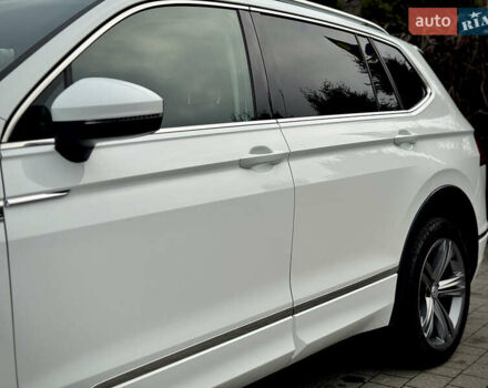 Білий Фольксваген Тігуан, об'ємом двигуна 2 л та пробігом 186 тис. км за 29999 $, фото 23 на Automoto.ua