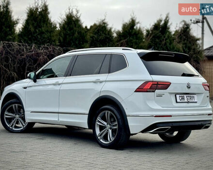 Білий Фольксваген Тігуан, об'ємом двигуна 2 л та пробігом 186 тис. км за 29999 $, фото 24 на Automoto.ua