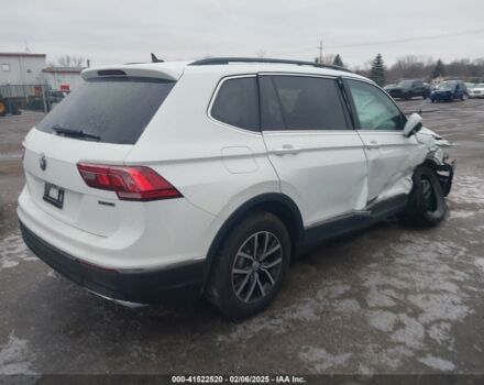 Білий Фольксваген Тігуан, об'ємом двигуна 2 л та пробігом 77 тис. км за 11450 $, фото 5 на Automoto.ua
