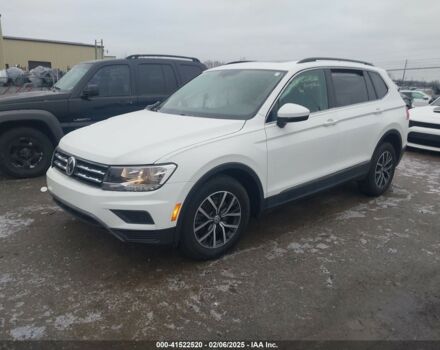 Білий Фольксваген Тігуан, об'ємом двигуна 2 л та пробігом 77 тис. км за 11450 $, фото 2 на Automoto.ua