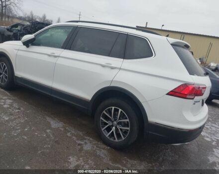 Білий Фольксваген Тігуан, об'ємом двигуна 2 л та пробігом 77 тис. км за 11450 $, фото 3 на Automoto.ua