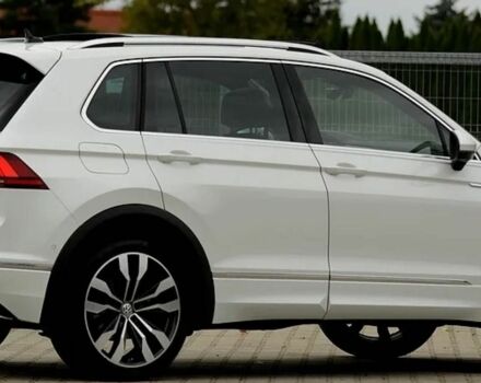 Белый Фольксваген Тигуан, объемом двигателя 2 л и пробегом 53 тыс. км за 13000 $, фото 2 на Automoto.ua