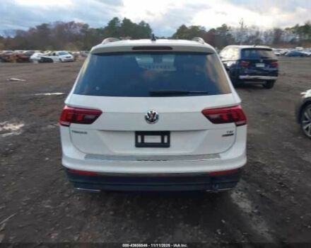 Белый Фольксваген Тигуан, объемом двигателя 2 л и пробегом 31 тыс. км за 5000 $, фото 4 на Automoto.ua