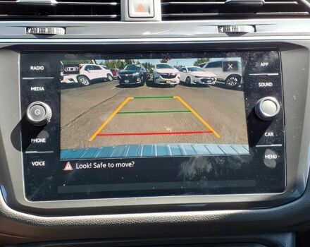 Білий Фольксваген Тігуан, об'ємом двигуна 2 л та пробігом 15 тис. км за 10700 $, фото 7 на Automoto.ua