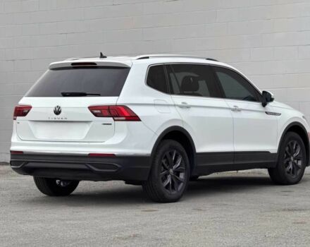 Білий Фольксваген Тігуан, об'ємом двигуна 2 л та пробігом 25 тис. км за 7800 $, фото 5 на Automoto.ua