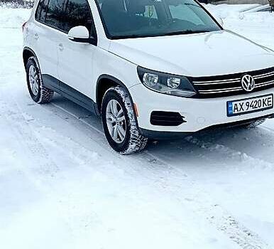 Белый Фольксваген Тигуан, объемом двигателя 2 л и пробегом 250 тыс. км за 12000 $, фото 1 на Automoto.ua