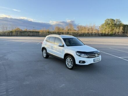 Білий Фольксваген Тігуан, об'ємом двигуна 2 л та пробігом 122 тис. км за 12200 $, фото 1 на Automoto.ua