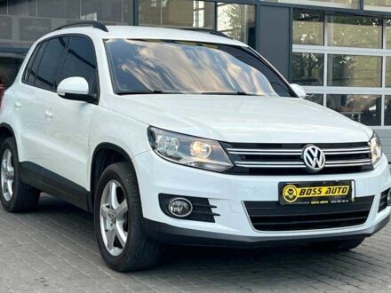 Білий Фольксваген Тігуан, об'ємом двигуна 2 л та пробігом 150 тис. км за 14900 $, фото 1 на Automoto.ua