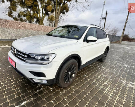 Білий Фольксваген Тігуан, об'ємом двигуна 2 л та пробігом 212 тис. км за 16500 $, фото 1 на Automoto.ua