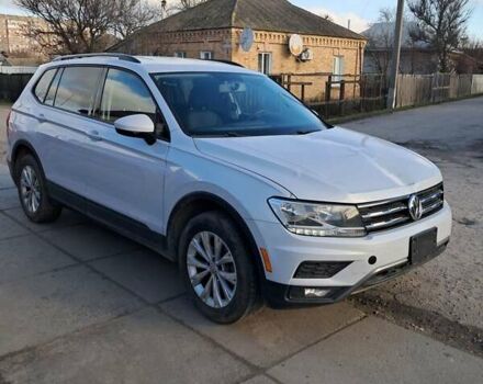 Белый Фольксваген Тигуан, объемом двигателя 2 л и пробегом 243 тыс. км за 13700 $, фото 1 на Automoto.ua
