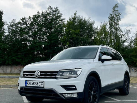 Білий Фольксваген Тігуан, об'ємом двигуна 2 л та пробігом 128 тис. км за 21500 $, фото 1 на Automoto.ua