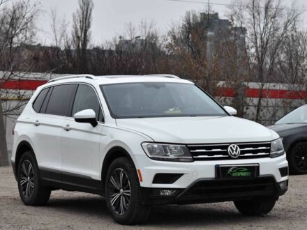 Белый Фольксваген Тигуан, объемом двигателя 2 л и пробегом 177 тыс. км за 17499 $, фото 1 на Automoto.ua