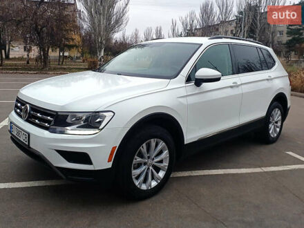 Білий Фольксваген Тігуан, об'ємом двигуна 2 л та пробігом 145 тис. км за 23600 $, фото 1 на Automoto.ua