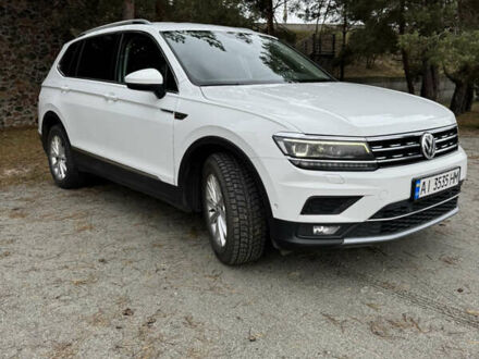 Білий Фольксваген Тігуан, об'ємом двигуна 1.98 л та пробігом 180 тис. км за 28700 $, фото 1 на Automoto.ua
