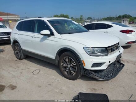 Белый Фольксваген Тигуан, объемом двигателя 2 л и пробегом 193 тыс. км за 13200 $, фото 1 на Automoto.ua