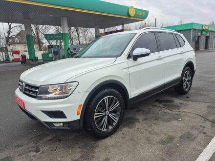 Білий Фольксваген Тігуан, об'ємом двигуна 2 л та пробігом 99 тис. км за 17900 $, фото 1 на Automoto.ua