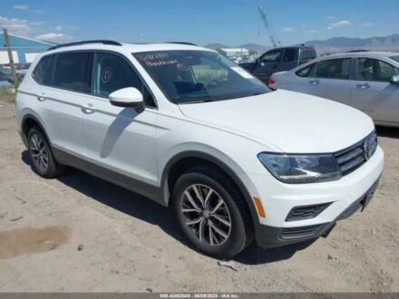 Белый Фольксваген Тигуан, объемом двигателя 2 л и пробегом 65 тыс. км за 6200 $, фото 1 на Automoto.ua