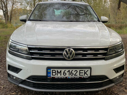 Белый Фольксваген Тигуан, объемом двигателя 1.97 л и пробегом 254 тыс. км за 24900 $, фото 1 на Automoto.ua