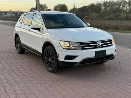 Белый Фольксваген Тигуан, объемом двигателя 2 л и пробегом 70 тыс. км за 14000 $, фото 1 на Automoto.ua