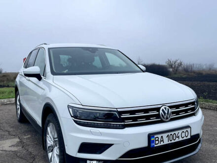 Білий Фольксваген Тігуан, об'ємом двигуна 1.97 л та пробігом 75 тис. км за 28000 $, фото 1 на Automoto.ua