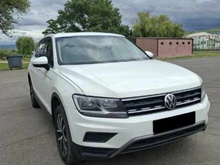 Білий Фольксваген Тігуан, об'ємом двигуна 2 л та пробігом 100 тис. км за 13250 $, фото 1 на Automoto.ua
